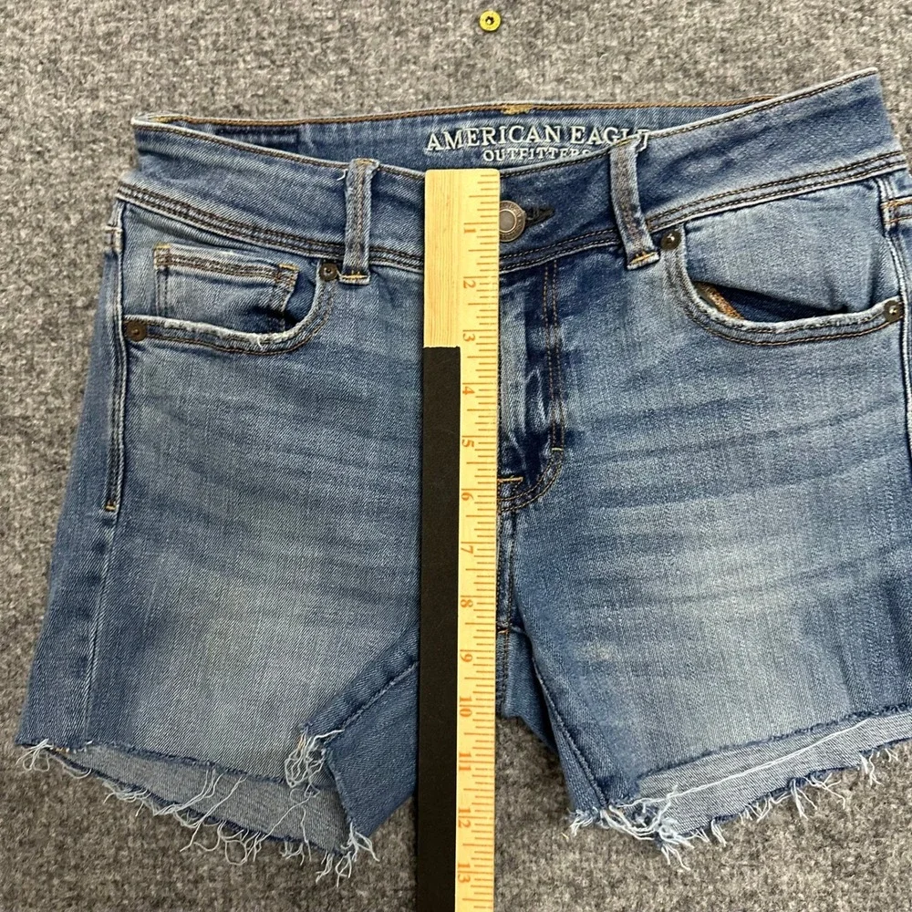 American Eagle Denim Shorts Womens Size 8 Long Blue Stretch Raw Hem Cut Offs